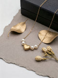"Whispers of the Sea" — Vintage Textured Golden Heart & Natural Pearl Necklace