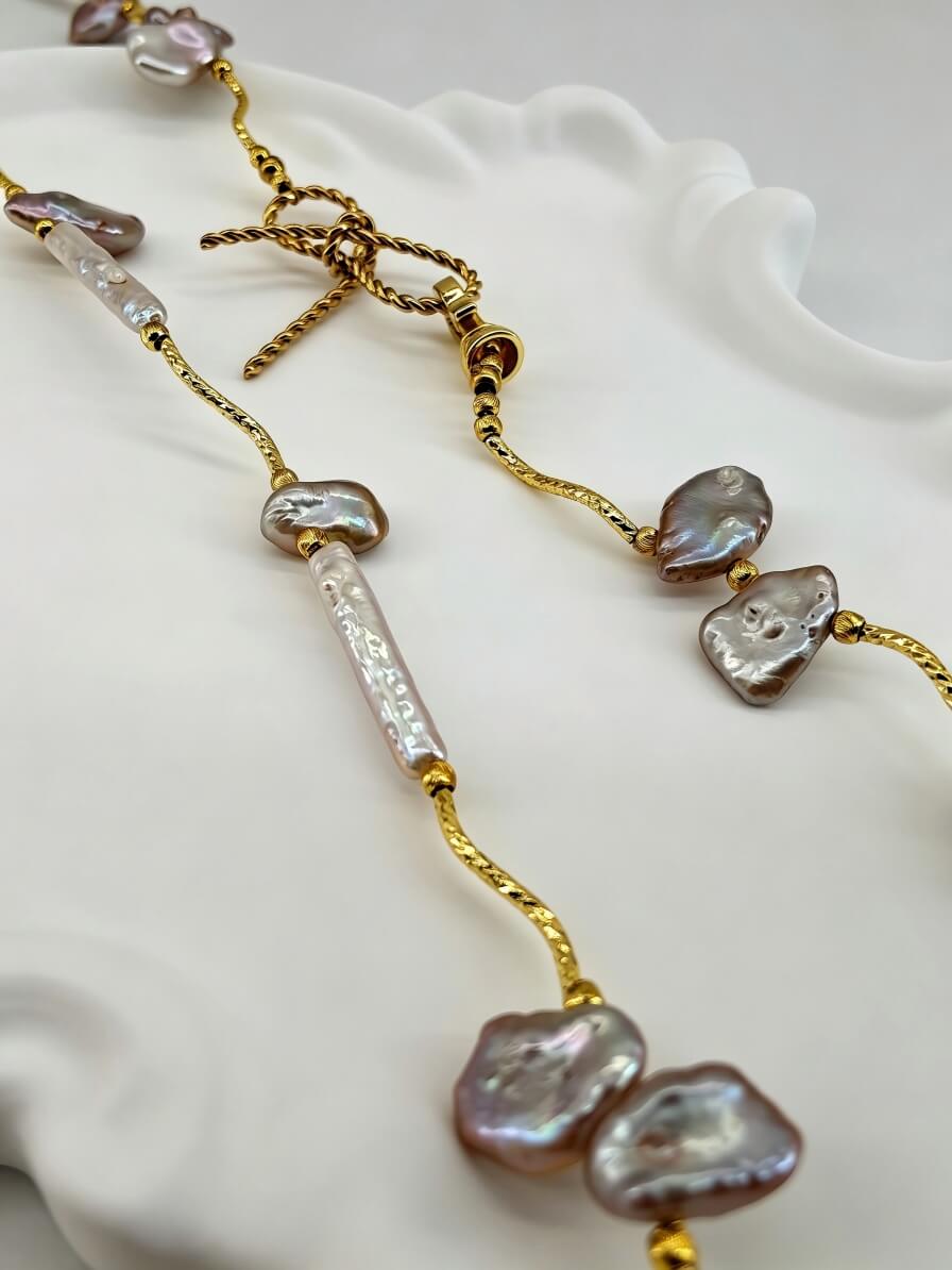 The Aphrodite Bow & Iridescent Baroque Pearl Necklace