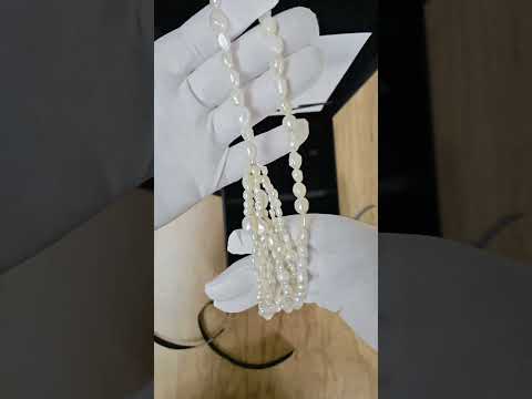 The Serpentine Tide Handcrafted Baroque Pearl Lariat Necklace